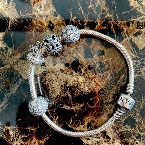 Pandora bracelet with charms and clips